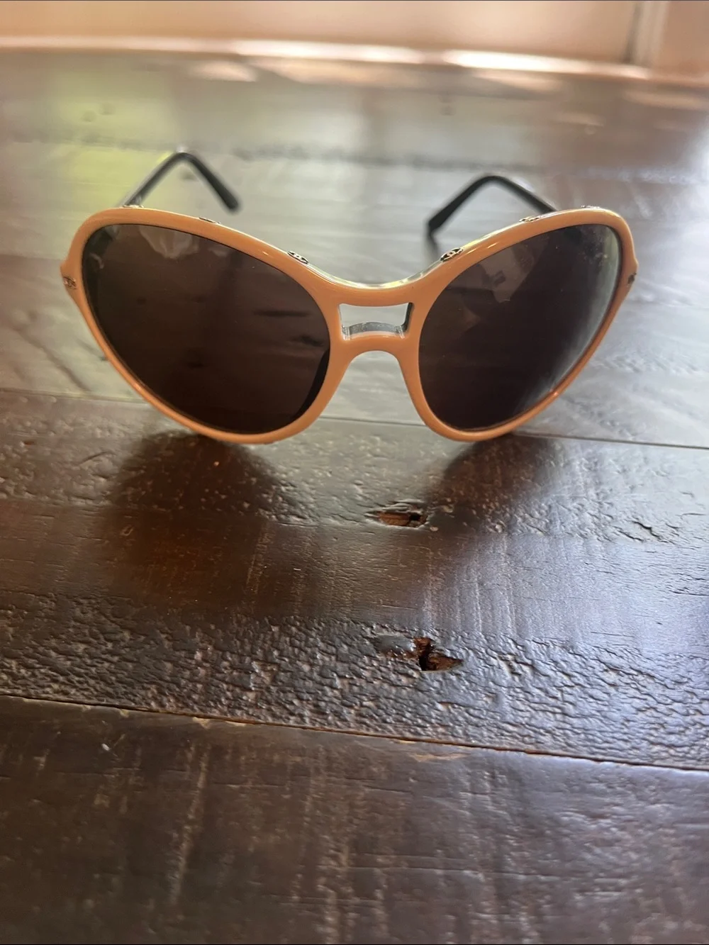 CHANEL Peach Frame Sunglasses with Dark Brown Lenses and Black Temples